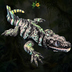 An articulated 3D printed Sailfin Lizard with a black, green, and pink marbled pattern against a dark forest background.