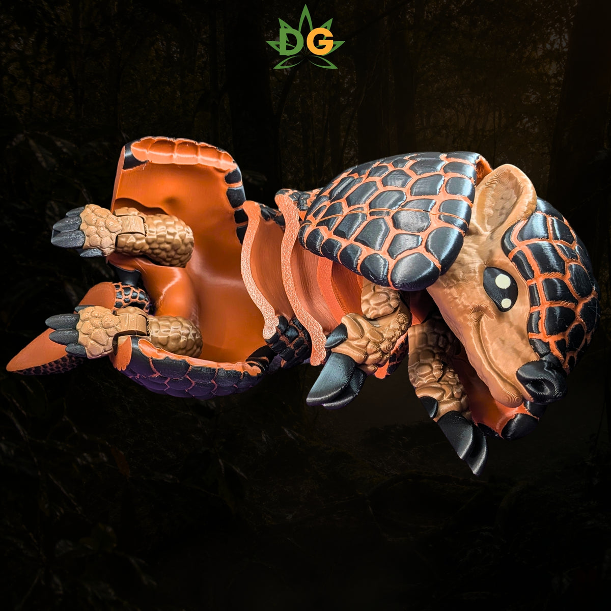 A 3D-printed XL Armadillo Flexi Figure with a segmented, black-and-orange shell, curled into a ball.