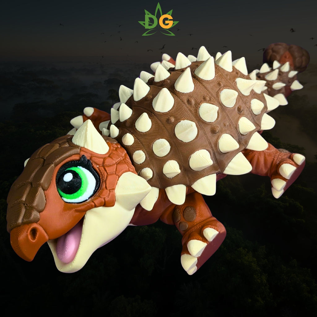A 3D-printed flexi ankylosaurus toy with brown skin, cream-colored spikes, and large green eyes.