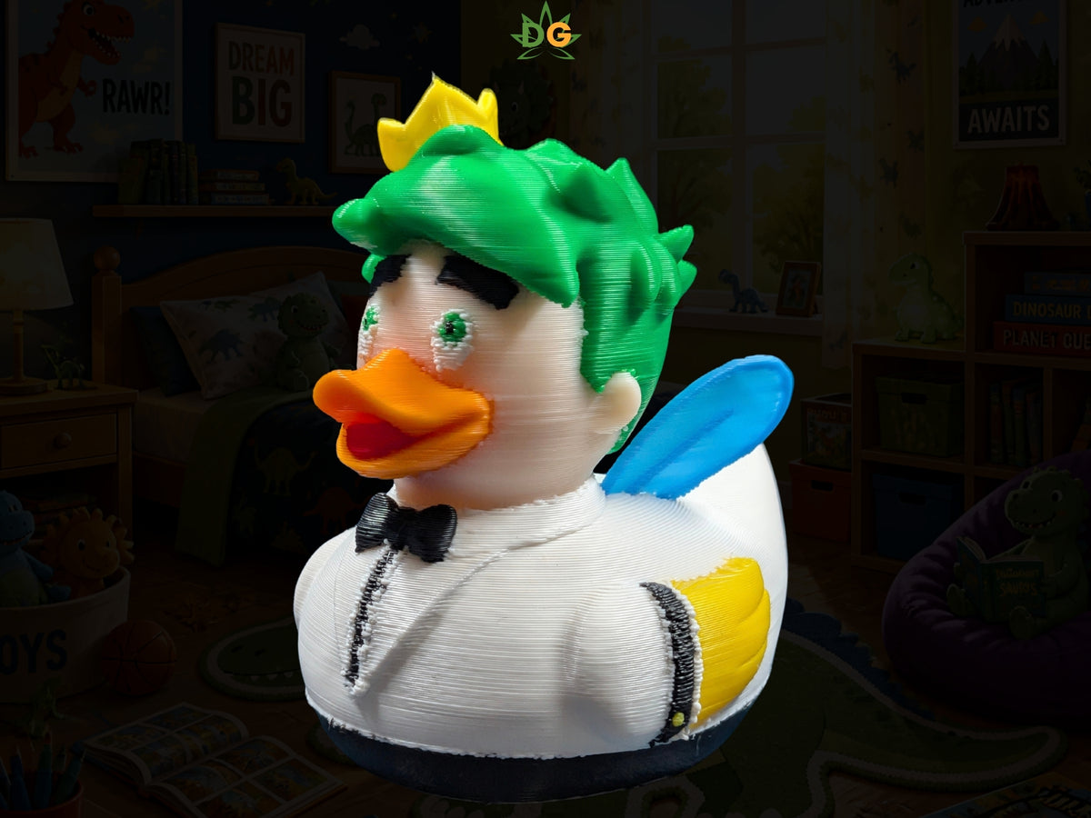A 3D printed fairy duck figurine wearing a crown and tuxedo with green hair and small blue wings on its back.