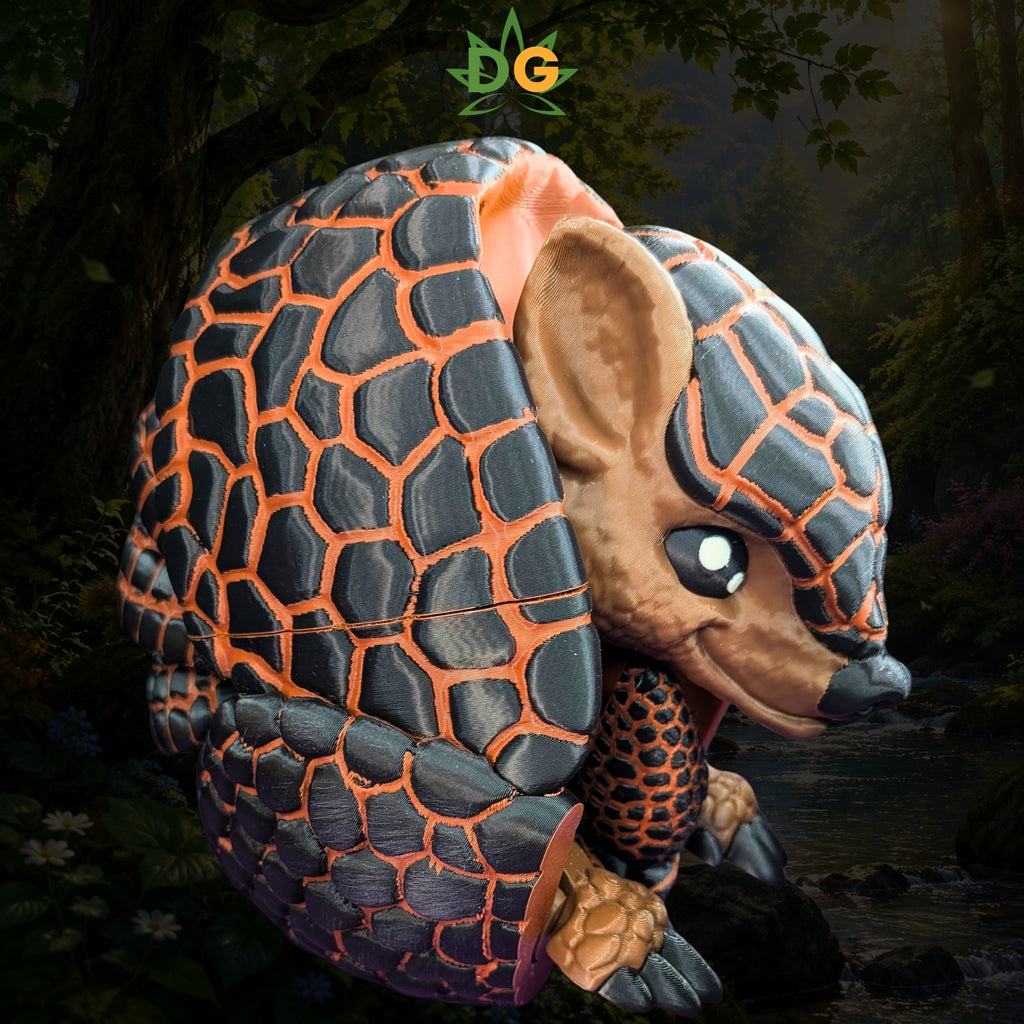 A 3D-printed XL flexi pangolin figurine with black and orange patterned scales.