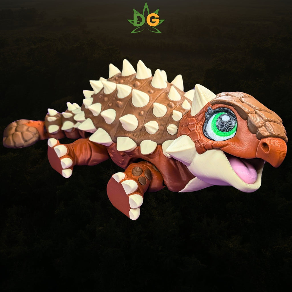 An articulated flexi ankylosaurus toy with brown scales, white spikes, and large green eyes.