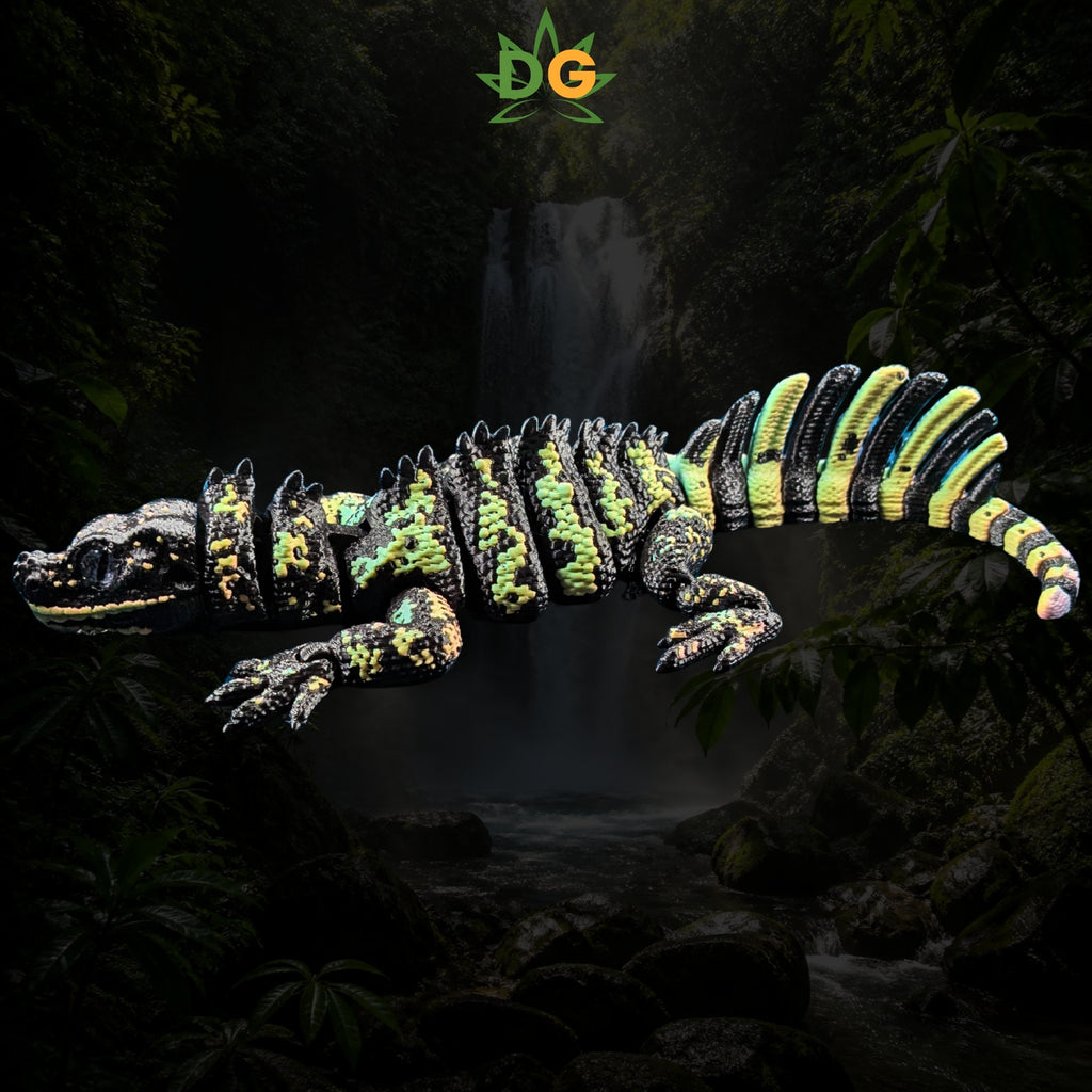 Articulated 3D-printed Sailfin Lizard with a black, green, and yellow patterned body against a jungle waterfall background.