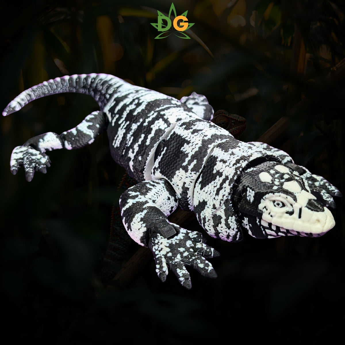 A black and white articulated Tegu lizard figure resting on a branch.