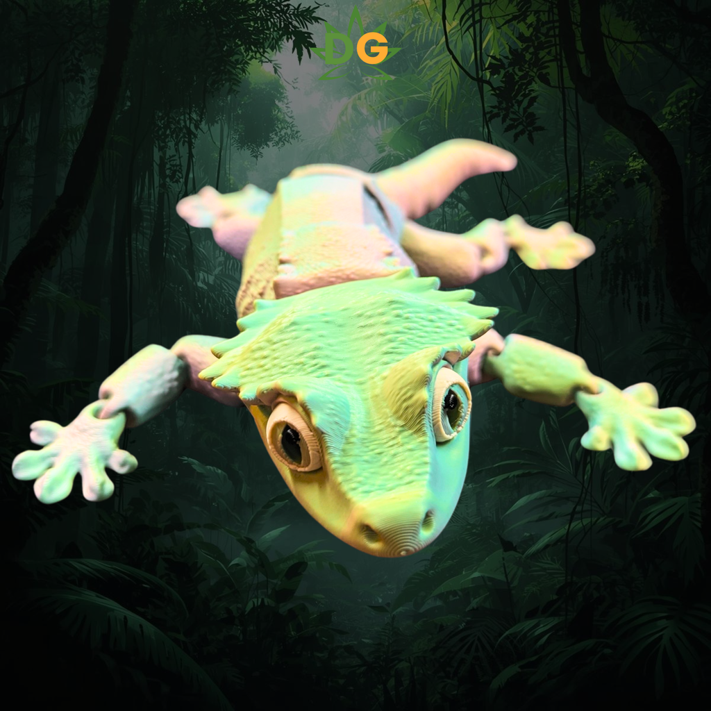 Crested Gecko Flexi with tri colors of green, yellow and pink on an amazon jungle background